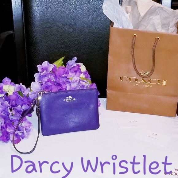Coach Handbags - 💯Authentic Coach Darcy Wristlet - F52205